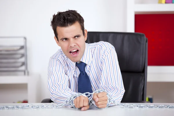 Biznesmen niewoli w jego biurze — Zdjęcie stockowe