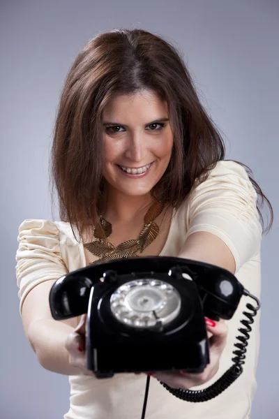Sexy woman holding a telephone — Stock Photo, Image