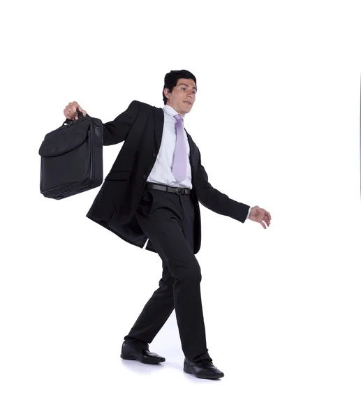 Uomo d'affari a piedi passo dopo passo — Foto Stock