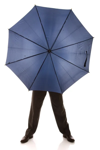 Hiding bewind an umbrella — Stock Photo, Image