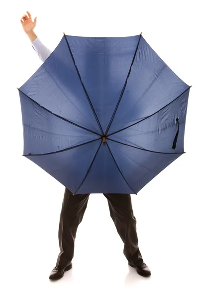 Gömmer sig bewind ett paraply — Stockfoto
