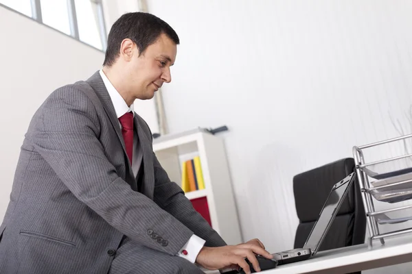 Mature businessman working at the office — Stock Photo, Image