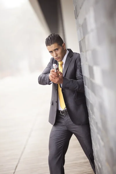 Security Businessman with a handgun — Stock Photo, Image