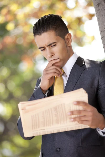 Businessman reading the newspaper — Stock Photo, Image