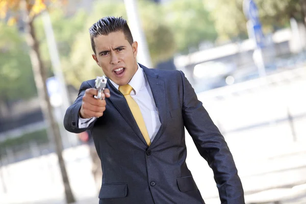 Security Businessman with a handgun — Stock Photo, Image