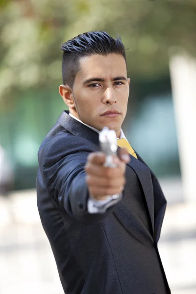 Uomo d'affari di sicurezza con una pistola — Foto Stock