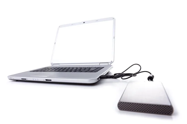 Laptop und externe Festplatte — Stockfoto