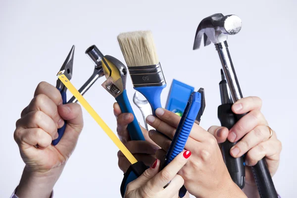 Hands with tools — Stock Photo, Image