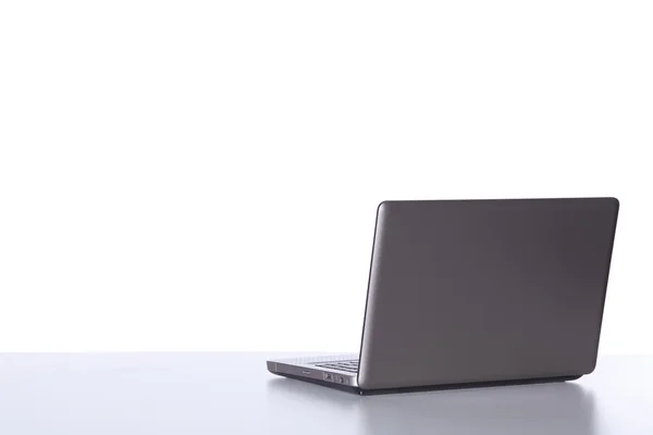 Laptop at the desk — Stock Photo, Image