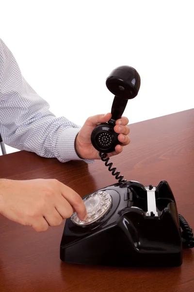 stock image Dialing a number on the telephone