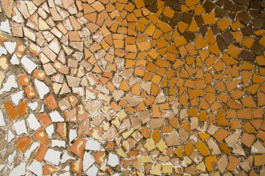 Mosaic tile pieces in guell park in barcelona clipart