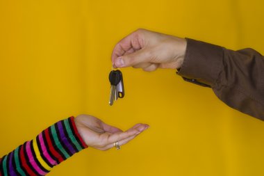 Giving the keys clipart