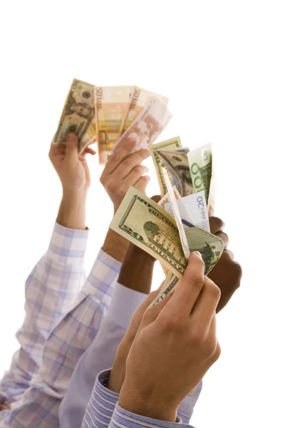 Mãos multirraciais com dinheiro — Fotografia de Stock