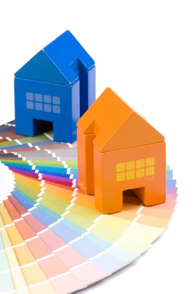 Toy house over a palette — Stock Photo, Image