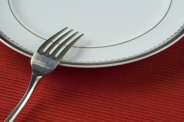 Fourchette et assiette en porcelaine — Photo