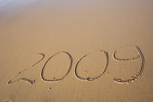 Ano 2009 na areia — Fotografia de Stock