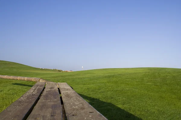 Golf lavička — Stock fotografie