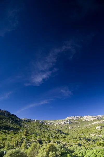 stock image Blue sky over the rocks mountain