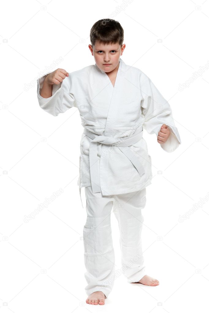 Serious boy in fighting stance
