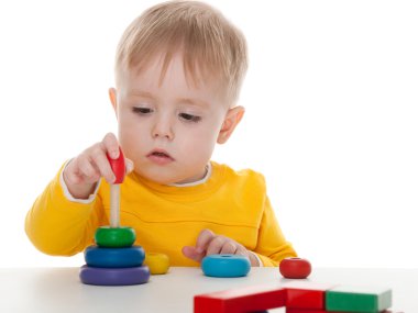 Boy playing pyramid clipart