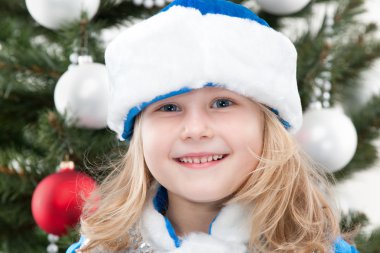 Snow Maiden at the christmas tree clipart