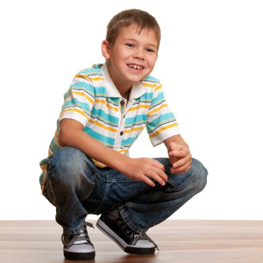 Squatting kid clipart