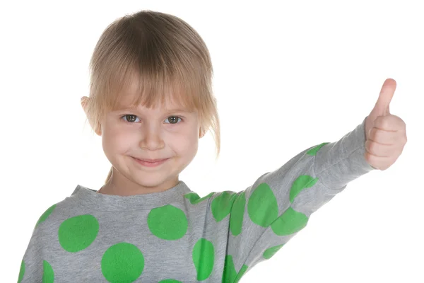 Little girl holding her thumb up — Stock Photo, Image