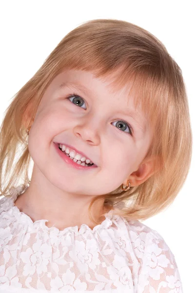 Vértes egy mosolygós kislány portréja — Stock Fotó