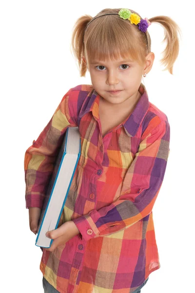 Serious girl with book — Stock Photo, Image