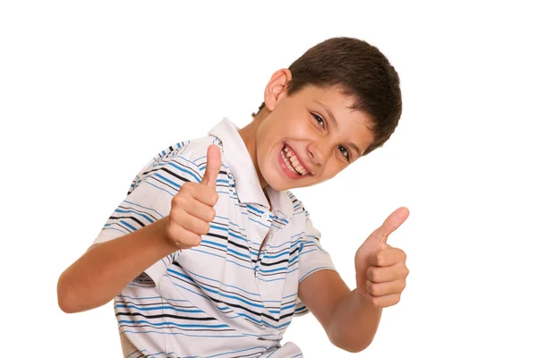 Успешный мальчик держит большие пальцы вверх — стоковое фото