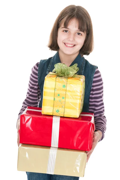 Menina sorridente com pilha de presentes — Fotografia de Stock