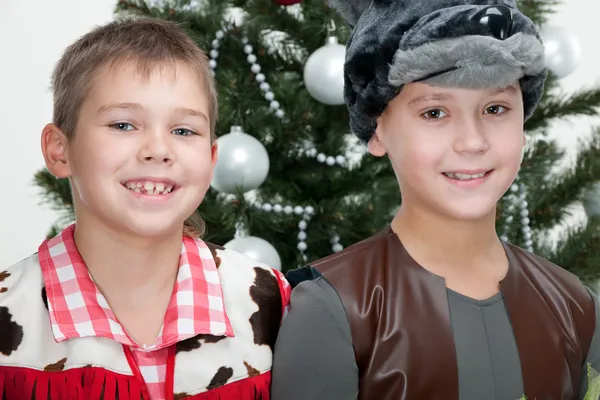 Two boys at the christmas masket ball — Stock Photo, Image