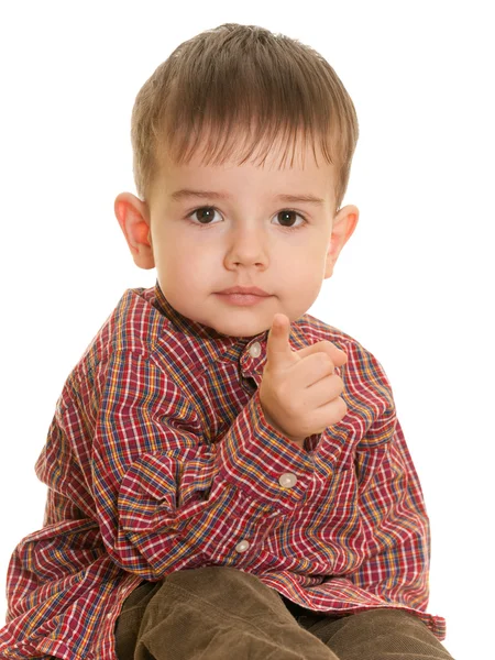 Menino pequeno apontando para frente — Fotografia de Stock