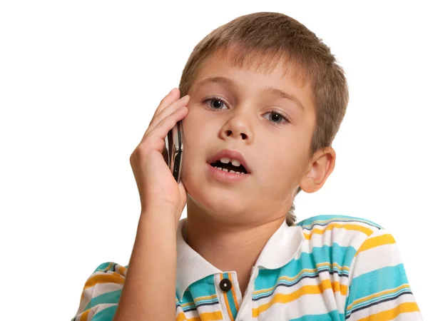 Serious kid talking over the phone — Stock Photo, Image