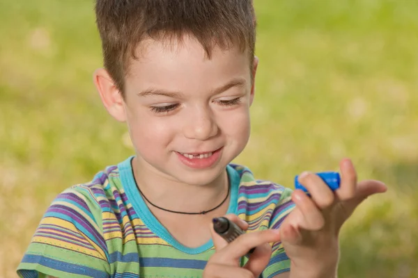 Drawing smiling boy — Stock Photo, Image