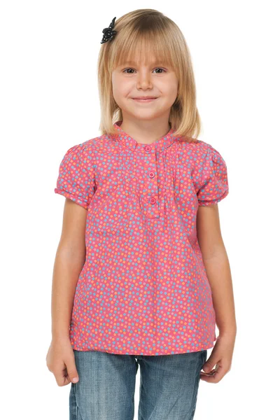 Liten flicka i en prickiga skjorta — Stockfoto