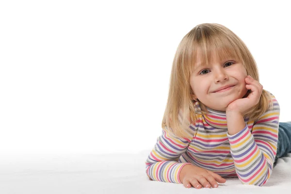 Smiling little girl on the white — Stock Photo, Image