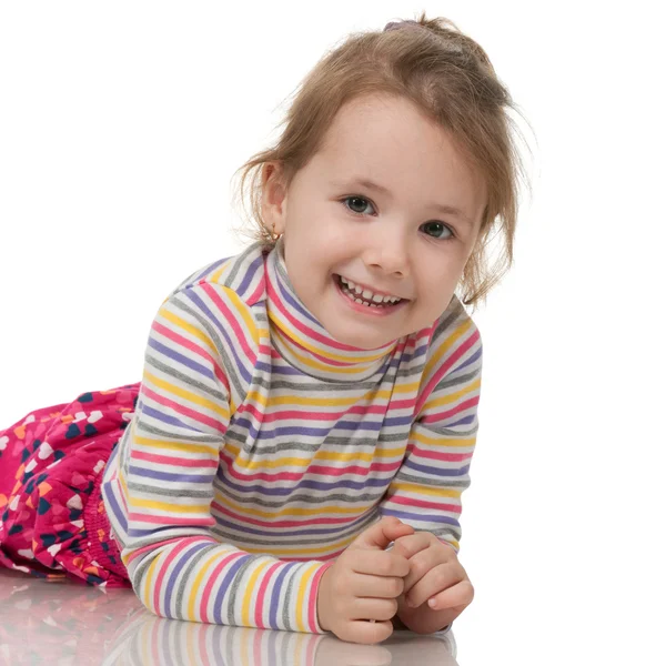 Malá holčička v pruhovaném svetru — Stock fotografie