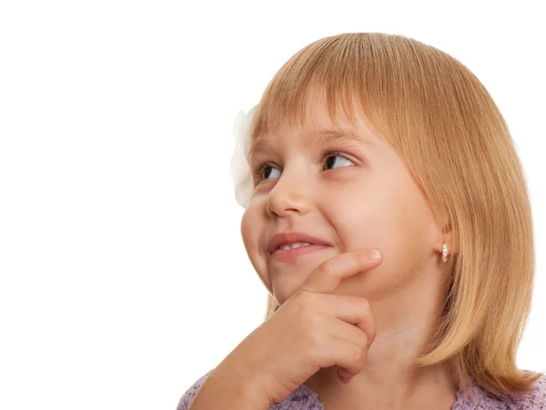 Красивая маленькая девочка смотрит в сторону Стоковое Изображение