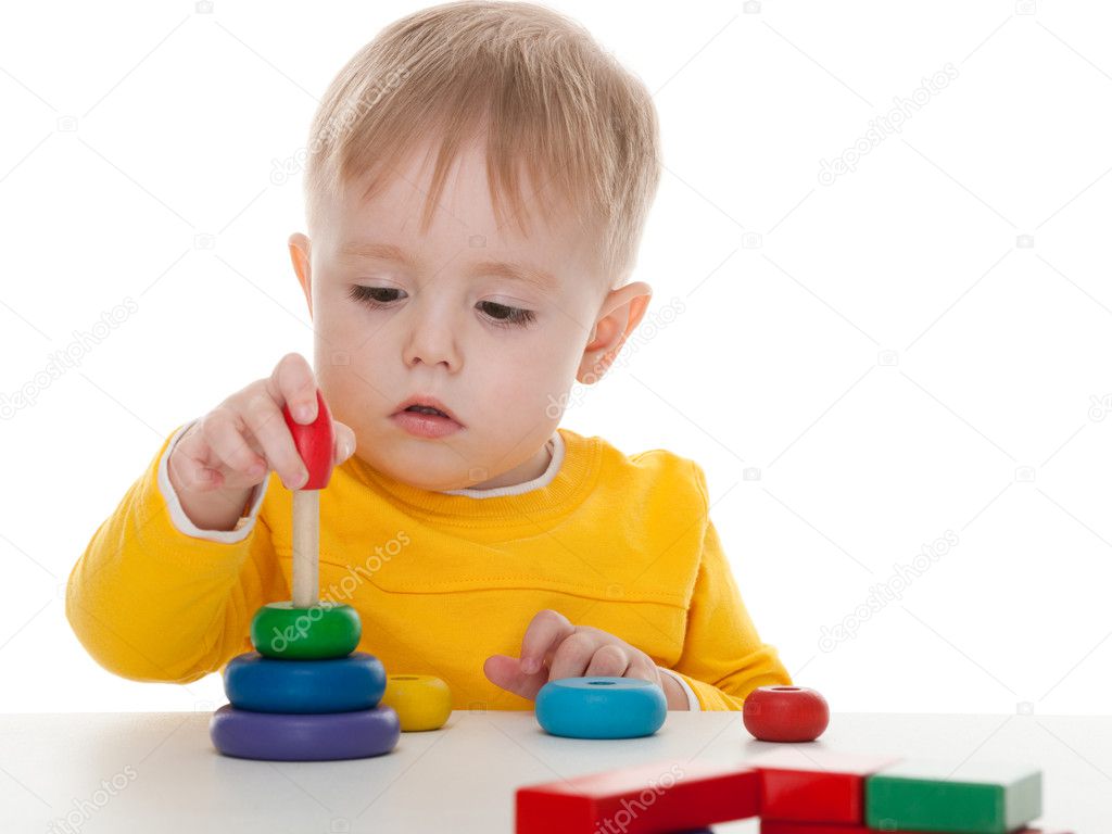 Boy playing pyramid