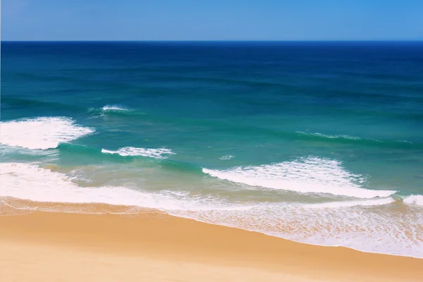 stock image Ocean waves and sand beach in Portugal