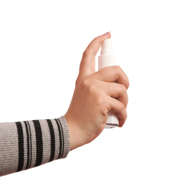Woman's hand pressing aerosol — Stock Photo, Image