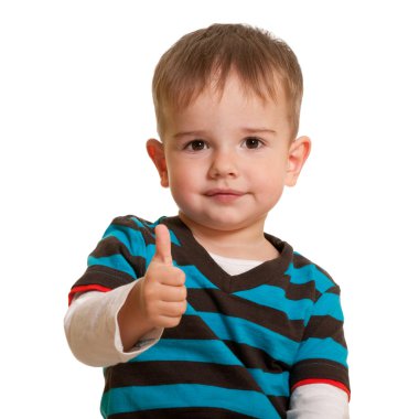 Portrait of a handsome smiling toddler in casual isolated on whi clipart