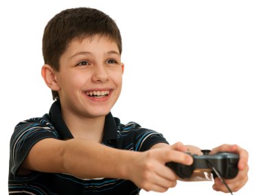 Happy boy playing a computer game with joystick clipart