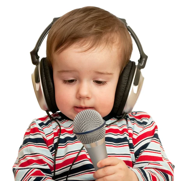 Given a speech toddler with headphones and microphone, closeup — Stock Photo, Image