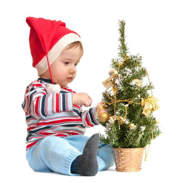 Kleiner Weihnachtsmann mit Neujahrsbaum — Stockfoto