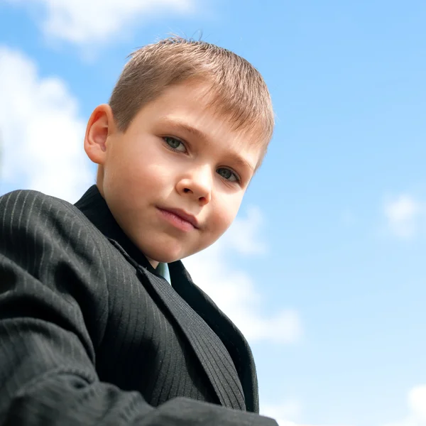 Portrait of a serious kid outdoors — Stock Photo, Image