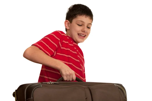 Носить тяжелый чемодан — стоковое фото
