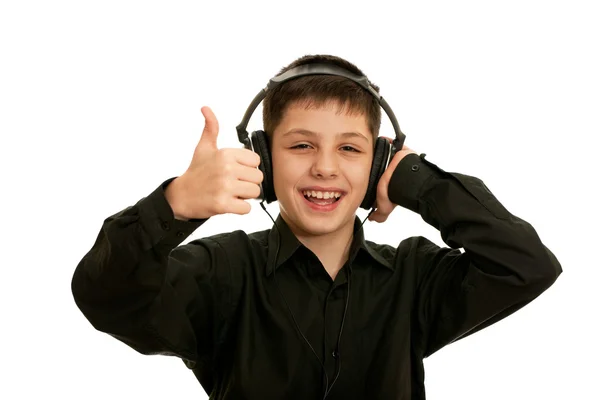 Bardzo szczęśliwy chłopiec ze słuchawkami — Zdjęcie stockowe
