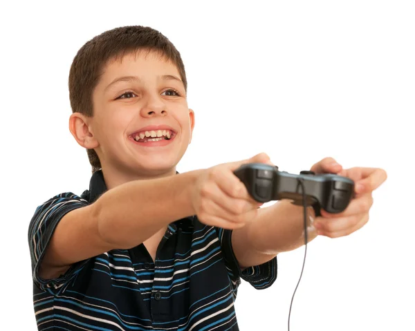 Chico riendo jugando un juego de ordenador con joystick — Foto de Stock